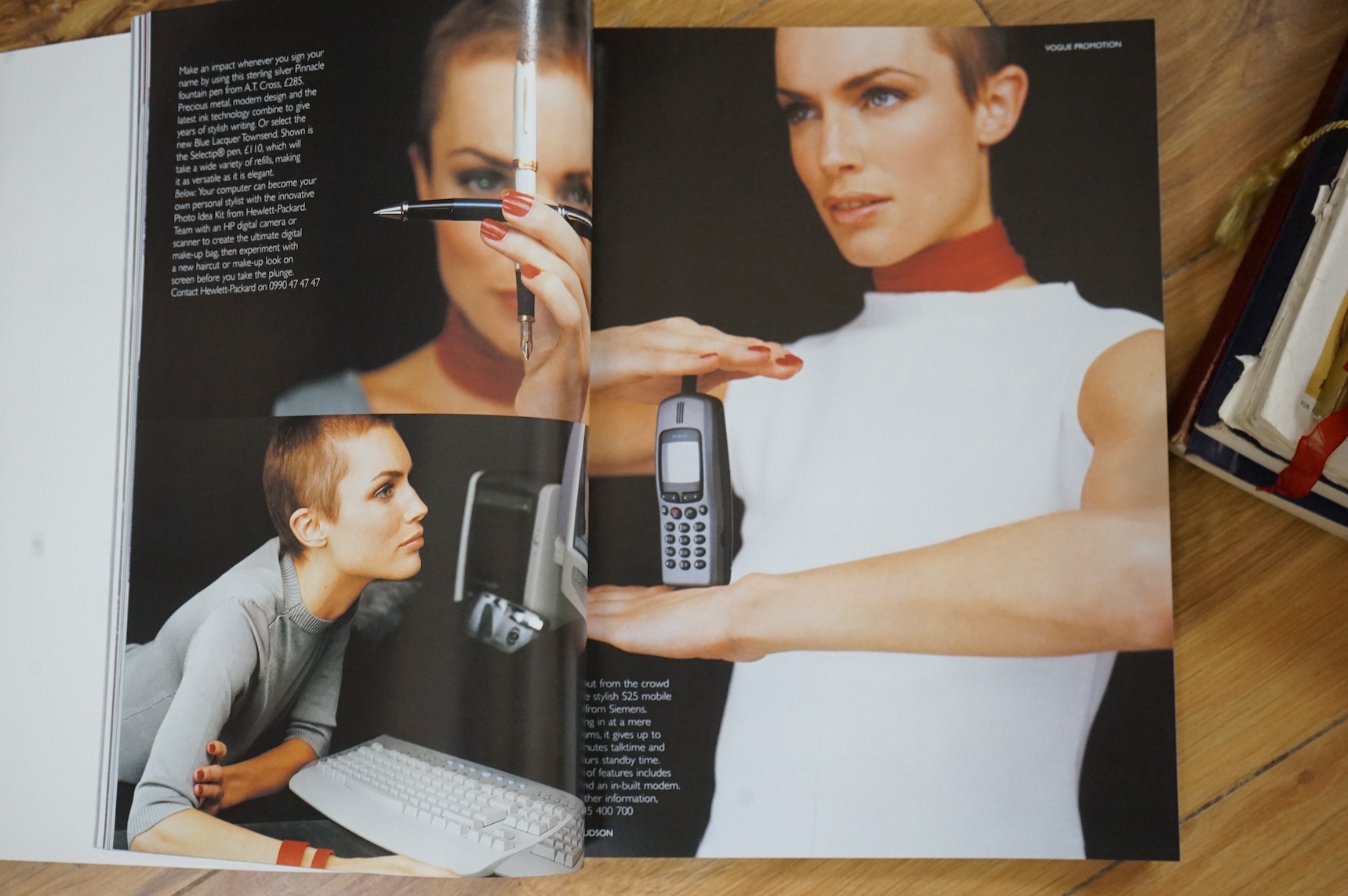 A collection of commemorative books and magazines to include Vogue